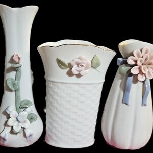 Vintage Set of 3 bud vases with raised flower in different sizes and patterns.